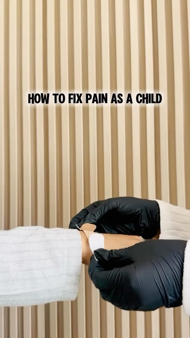 How to fix pain as a child: a gloved hand holding a small arm