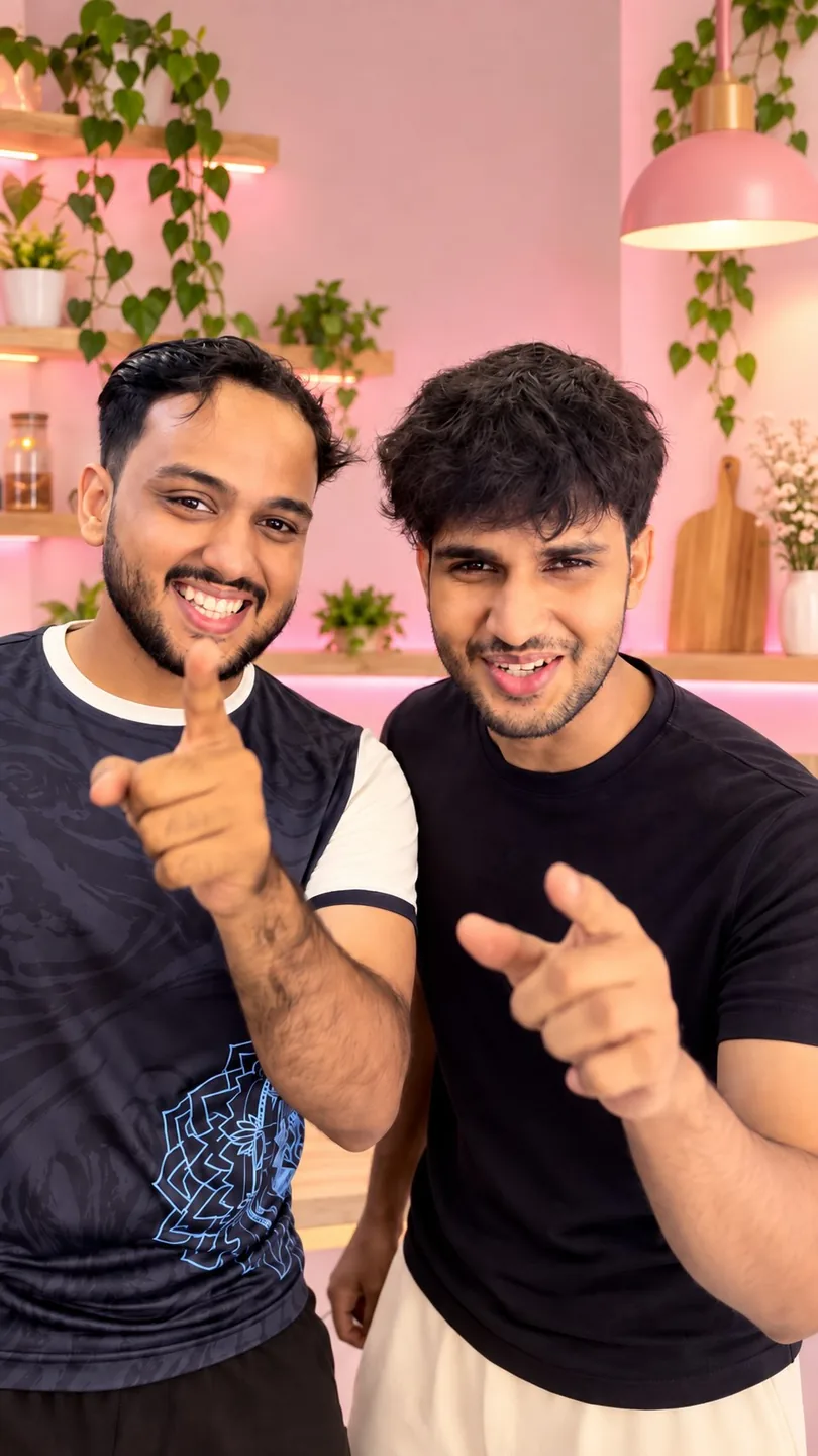 Two friends pointing at the camera in the pink café