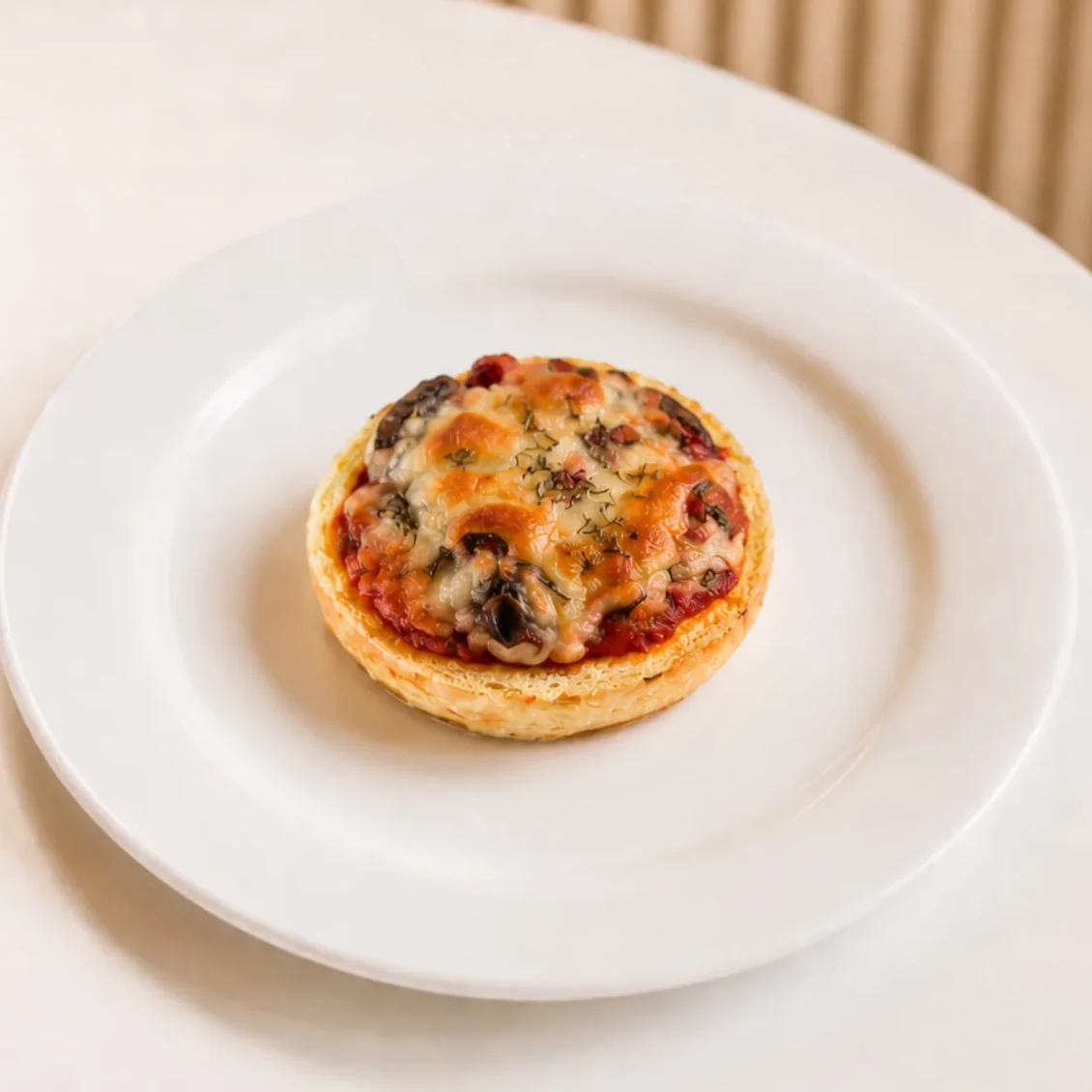 Cheesy Chicken Pizza on a white plate, their photograph